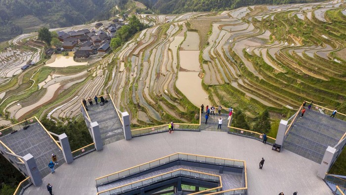 CONGJIANG, CHINA - APRIL 16, 2023 - Aerial photo taken on April 16, 2023 shows the view of rice terraces in Jiachai village, Jiapang township, Congjiang county, Southwest China's Guizhou province. (Photo credit should read CFOTO/Future Publishing via Getty Images)