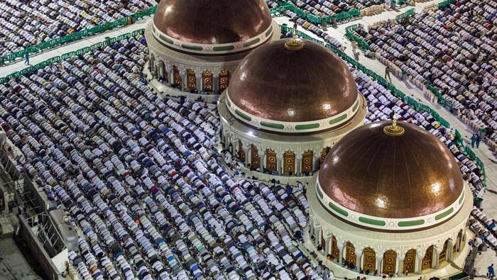 Muslim worshippers pray around the Kaaba, Islams holiest shrine, at the Grand Mosque in the holy city of Mecca on April 17, 2023, on the night of 27 Ramadan, believed to be Laylat al-Qadr, one of the holiest nights during the holy fasting month of Ramadan. (Photo by Abdel Ghani BASHIR / AFP) (Photo by ABDEL GHANI BASHIR/AFP via Getty Images)