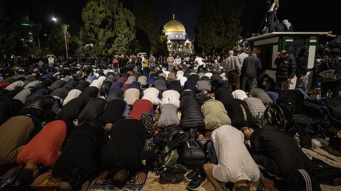 JERUSALEM - APRIL 17: An aerial view of the Muslims gather at the Al-Aqsa Mosque on the night of Laylat al-Qadr to perform prayer in Jerusalem on April 17, 2023. (Photo by Mostafa Alkharouf/Anadolu Agency via Getty Images)