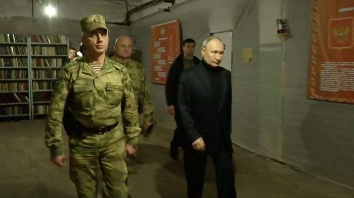 Russian President Vladimir Putin visits the national guard headquarters in the Luhansk Region, Russian-controlled Ukraine, in this still image taken from handout video released on April 18, 2023. Kremlin.ru/Handout via REUTERS
