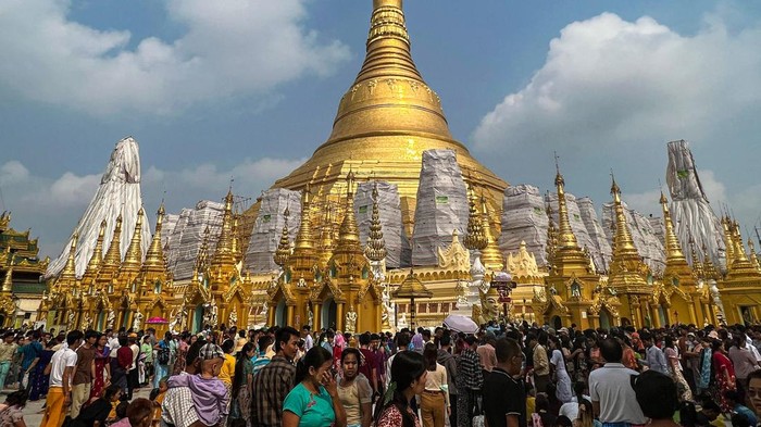 Buddhist devotees visit the Shwedagon pagoda following the Thingyan festival that marks the Burmese New Year in Yangon on April 17, 2023. (Photo by Sai Aung MAIN / AFP) (Photo by SAI AUNG MAIN/AFP via Getty Images)