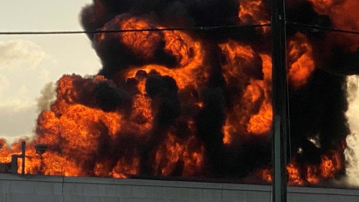 Flames and smoke rise from the site of an accident involving a fuel tank trailer in Brownsville, Texas, U.S., April 17, 2023 in this picture obtained from social media.  Victor Ponce/via REUTERS  THIS IMAGE HAS BEEN SUPPLIED BY A THIRD PARTY. MANDATORY CREDIT. NO RESALES. NO ARCHIVES.