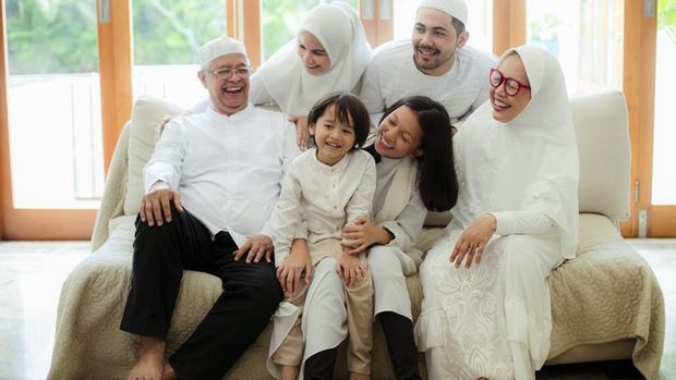 Family blessing during raya celebration