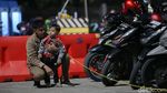 Potret Lelah Anak-anak Saat Ikut Mudik dengan Motor