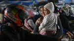 Potret Lelah Anak-anak Saat Ikut Mudik dengan Motor