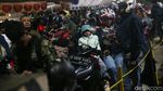 Potret Lelah Anak-anak Saat Ikut Mudik dengan Motor