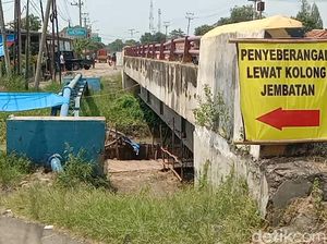 Cerita Warga Mengelola Penyebrangan Kolong Jembatan Ketika Arus Mudik