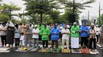Khusyuknya Salat Idul Fitri Meski Diguyur Hujan