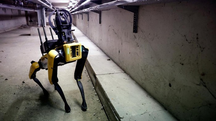 The 'Spot' Robot dog named Perceval, developed by Boston-based Dynamics, inspects a suburban rapid transit (RER) sub-dock with Paris transport RATP networks maintenance team, in Torcy, near Paris, France, April 18, 2023. REUTERS/Sarah Meyssonnier     TPX IMAGES OF THE DAY