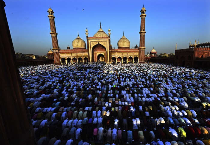 Muslims perform an Eid al-Fitr prayer marking the end of the holy fasting month of Ramadan at the Jama Masjid, in New Delhi, India, Saturday, April 22, 2023. (AP Photo/Deepanshu Aggarwal)