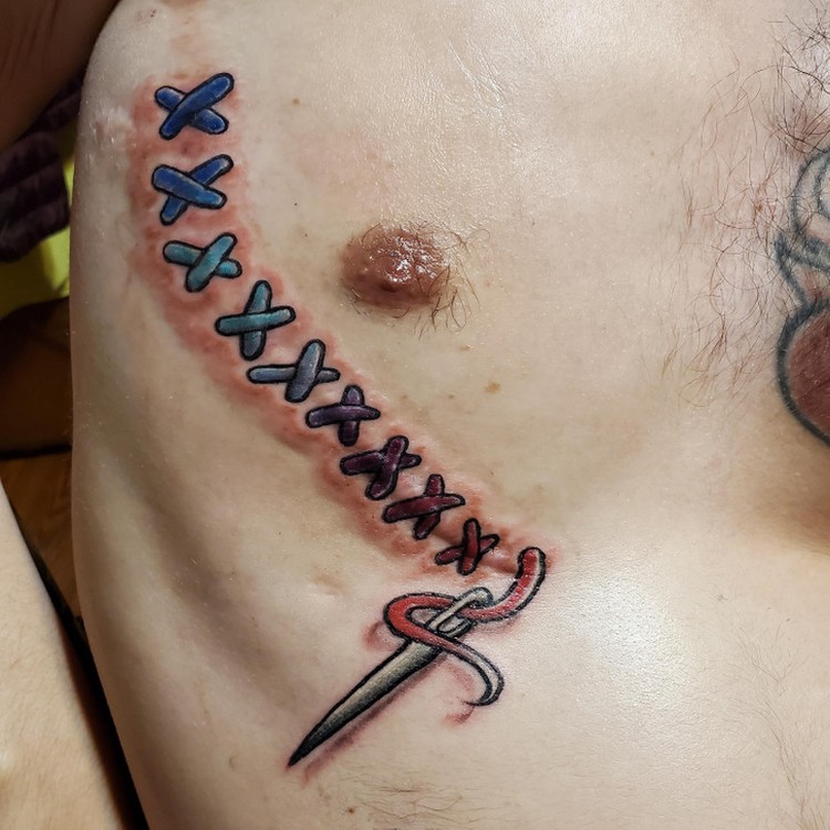 Fotoinet Seni Tato Menutupi Tubuh yang Tak sempurna Menjadi Artistik