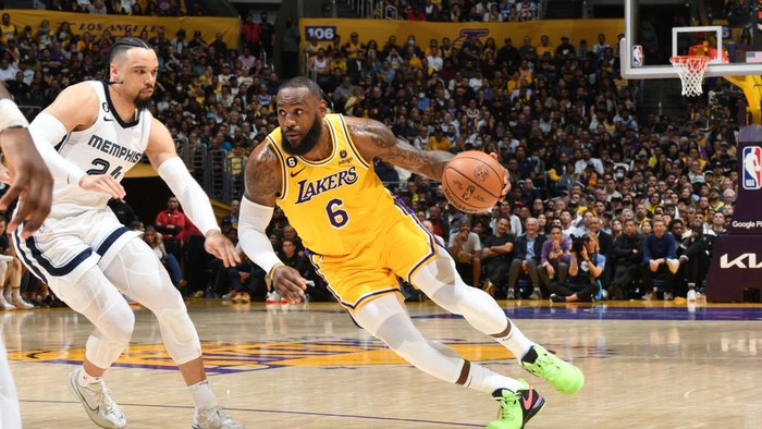 LOS ANGELES, CA - APRIL 24: LeBron James #6 of the Los Angeles Lakers dribbles the ball during Round One Game Four of the 2023 NBA Playoffs against the Memphis Grizzlies on April 24, 2023 at Crypto.Com Arena in Los Angeles, California. NOTE TO USER: User expressly acknowledges and agrees that, by downloading and/or using this Photograph, user is consenting to the terms and conditions of the Getty Images License Agreement. Mandatory Copyright Notice: Copyright 2023 NBAE (Photo by Andrew D. Bernstein/NBAE via Getty Images)