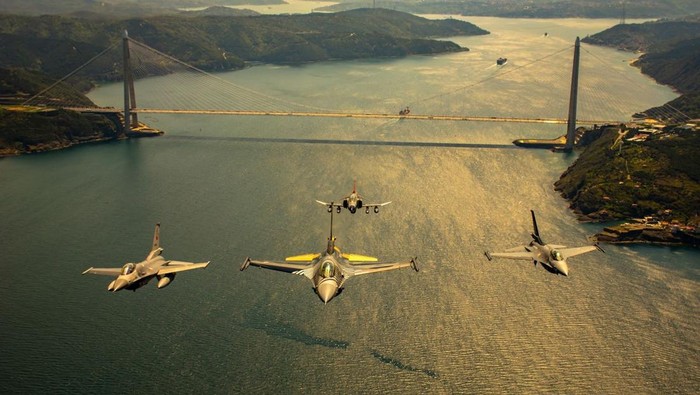 ISTANBUL, TURKIYE - ARRIL 25: (----EDITORIAL USE ONLY - MANDATORY CREDIT - 'NATIONAL DEFENCE MINISTRY OF TURKIYE / HANDOUT' - NO MARKETING NO ADVERTISING CAMPAIGNS - DISTRIBUTED AS A SERVICE TO CLIENTS----) Turkish Air Forces perform salute flight with warplanes above Bosphorus prior to TEKNOFEST 2023 in Istanbul, Turkiye on April 25, 2023. (Photo by Turkish Defense Ministry / Handout/Anadolu Agency via Getty Images)