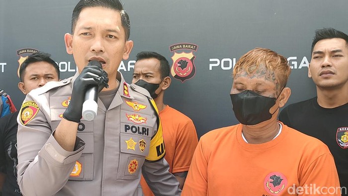 Dadang Buaya preman terkenal di Garut diamankan polisi setelah membacok dua orang warga.