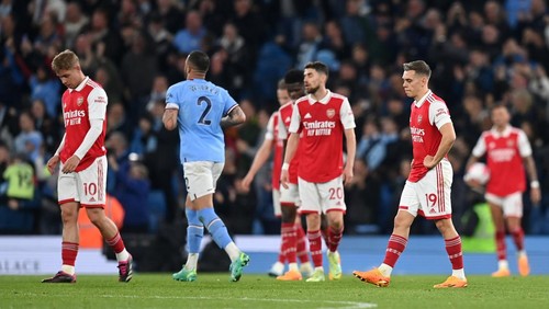 MANCHESTER, ENGLAND - APRIL 26: Leandro Trossard of Arsenal looks dejected after Erling Haaland of Manchester City (not pictured) scored their sides fourth goal during the Premier League match between Manchester City and Arsenal FC at Etihad Stadium on April 26, 2023 in Manchester, England. (Photo by Michael Regan/Getty Images)