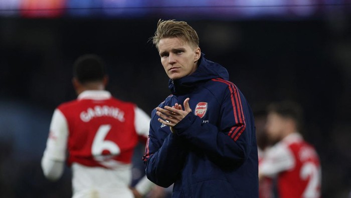 Soccer Football - Premier League - Manchester City v Arsenal - Etihad Stadium, Manchester, Britain - April 26, 2023 Arsenals Martin Odegaard looks dejected after the match Action Images via Reuters/Lee Smith EDITORIAL USE ONLY. No use with unauthorized audio, video, data, fixture lists, club/league logos or live services. Online in-match use limited to 75 images, no video emulation. No use in betting, games or single club /league/player publications.  Please contact your account representative for further details.