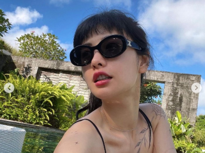Nana eks After School Berbikini di Bali, Tato Tubuhnya Jadi Sorotan