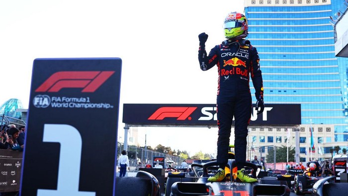 BAKU, AZERBAIJAN - APRIL 29: Sprint winner Sergio Perez of Mexico and Oracle Red Bull Racing celebrates in parc ferme during the Sprint ahead of the F1 Grand Prix of Azerbaijan at Baku City Circuit on April 29, 2023 in Baku, Azerbaijan. (Photo by Mark Thompson/Getty Images)