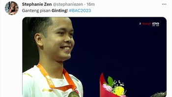 Senyum kemenangan Ginting memesona netizen. Foto: Twitter