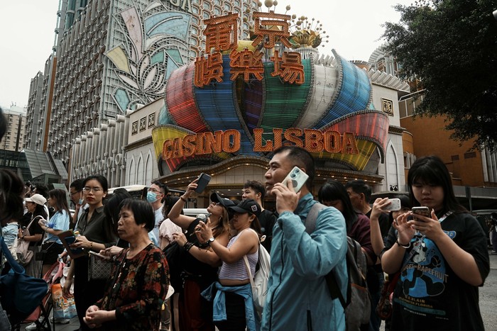 Visitors walk outside the ruins of Saint Pauls during Labour Day holiday in Macau, China, April 30, 2023. REUTERS/Lam Yik