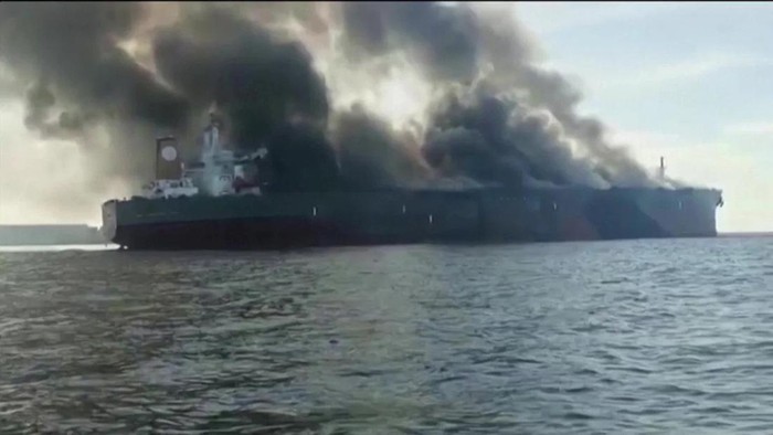 The oil tanker caught fire in waters off the coast of southern Malaysia on Monday, according to local authorities.(Malaysia Maritime Enforcement Agency/Reuters)