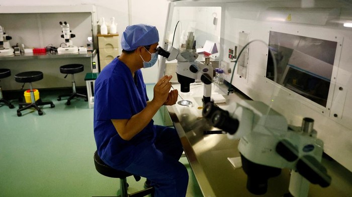 Doctor Xu Xiaoming, director of the embryologic laboratory of the assisted reproductive centre, shows the room for egg retrieval surgery, at the Beijing Perfect Family Hospital, which specialises in fertility treatments, in Beijing, China April 6, 2023. REUTERS/Tingshu Wang