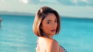 7 Potret Terbaru Marion Jola Liburan ke Kupang, Tato di Pinggang Curi Atensi