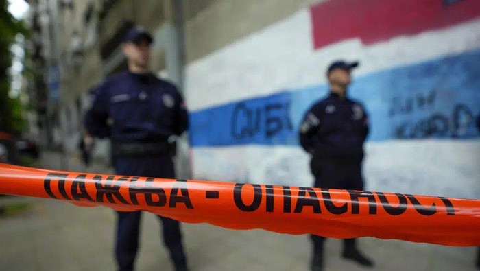 Police block streets around the Vladislav Ribnikar school in Belgrade, Serbia, Wednesday, May 3, 2023. A teenage boy opened fire early Wednesday in a school in central Belgrade, causing injuries. (AP Photo/Darko Vojinovic)
