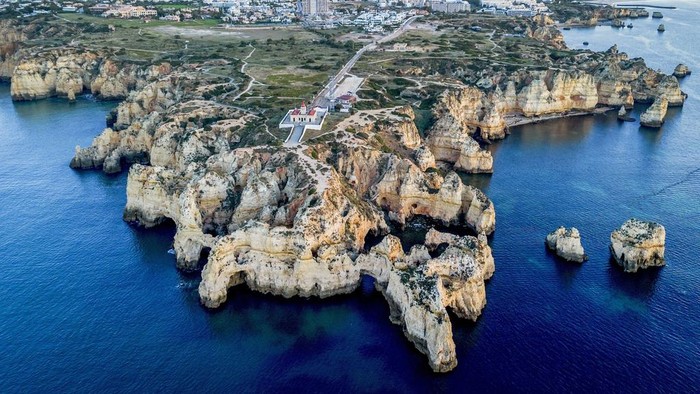 Water surrounds the coast of Cabo da Roca near Lisbon, Portugal, Friday, April 14, 2023. (AP Photo/Michael Probst)