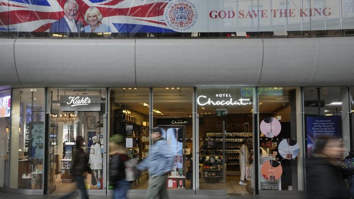 A banner celebrating the coronation of Britain's King Charles III is displayed at Kings Cross Station in London, Monday, May 1, 2023. The coronation of King Charles III will takes place at Westminster Abbey on May 6. (AP Photo/Kirsty Wigglesworth)
