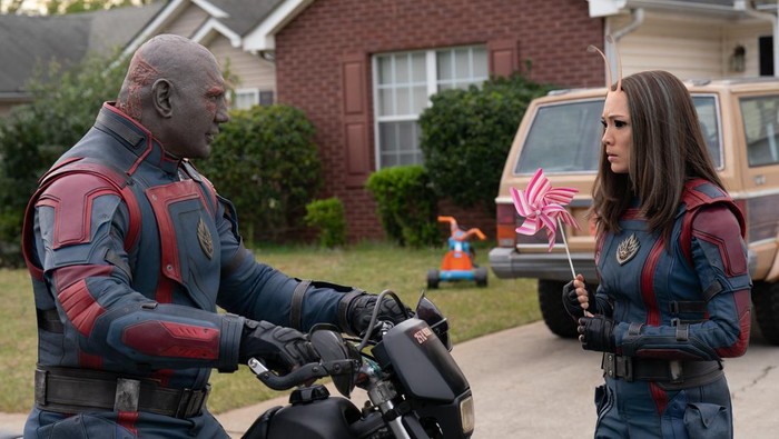 (L-R): Dave Bautista as Drax and Pom Klementieff as Mantis in Marvel Studios Guardians of the Galaxy Vol. 3. Photo by Jessica Miglio. © 2023 MARVEL.