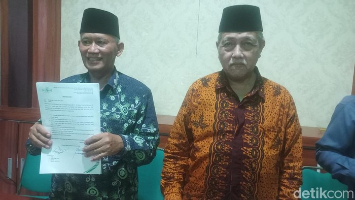 Papan nama Pagar Nusa Lamongan yang dirusak sekelompok OTK.