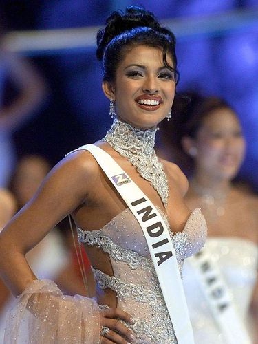 LONDON, UNITED KINGDOM:  18 year old Priyanka Chopra of India poses on stage during the Miss World final at the Millenium Dome in London, 30 November 2000. Chopra won the contest. (Photo credit should read GERRY PENNY/AFP via Getty Images)