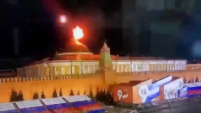 A still image taken from video shows a flying object exploding in an intense burst of light near the dome of the Kremlin Senate building during the alleged Ukrainian drone attack in Moscow, Russia, in this image taken from video obtained by Reuters May 3, 2023. Ostorozhno Novosti/Handout via REUTERS ATTENTION EDITORS - THIS IMAGE WAS PROVIDED BY A THIRD PARTY. NO RESALES. NO ARCHIVES. MANDATORY CREDIT.
