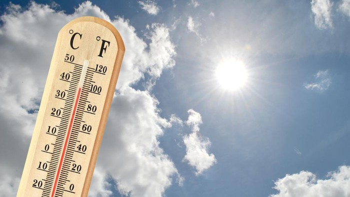 Thermometer showing high temperature. Summer heat concept
