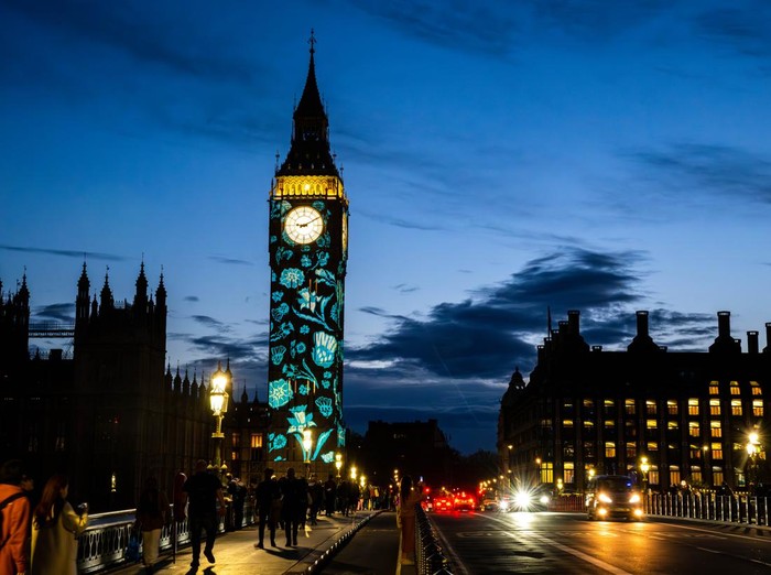 LONDON, ENGLAND - MAY 04:  The Elizabeth Tower,  commonly known as Big Ben after its great bell, is illuminated ahead the Coronation with good wishes and the national flowers of the UK on May 04, 2023 in London, England. The Coronation of King Charles III and The Queen Consort will take place on May 6, part of a three-day celebration. (Photo by Christopher Furlong/Getty Images)