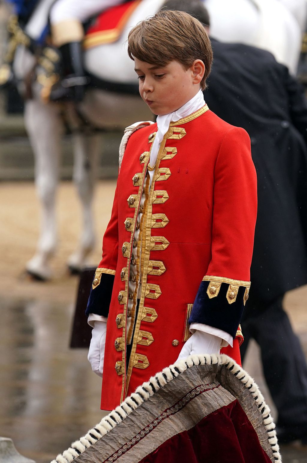 LONDON, ENGLAND - MAY 06: Britain's Prince William, Prince of Wales, Princess Charlotte, Prince Louis and Britain's Catherine, Princess of Wales attend the Coronation of King Charles III and Queen Camilla at Westminster Abbey on May 6, 2023 in London, England. The Coronation of Charles III and his wife, Camilla, as King and Queen of the United Kingdom of Great Britain and Northern Ireland, and the other Commonwealth realms takes place at Westminster Abbey today. Charles acceded to the throne on 8 September 2022, upon the death of his mother, Elizabeth II. (Photo by Yui Mok  - WPA Pool/Getty Images)