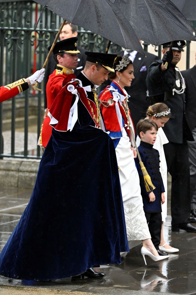 LONDON, ENGLAND - MAY 06:  Prince William, Catherine, Princess of Wales, and their children Princess Charlotte and Prince Louis arrive at Westminster Abbey to attend the Coronation of King Charles III and Queen Camilla on May 6, 2023 in London, England. The Coronation of Charles III and his wife, Camilla, as King and Queen of the United Kingdom of Great Britain and Northern Ireland, and the other Commonwealth realms takes place at Westminster Abbey today. Charles acceded to the throne on 8 September 2022, upon the death of his mother, Elizabeth II. (Photo by Toby Melville - WPA Pool/Getty Images)