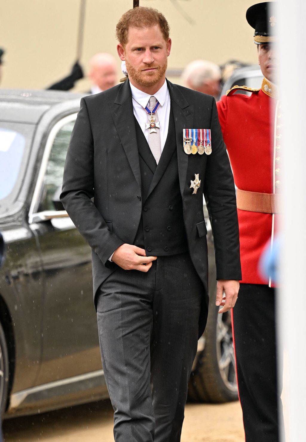 Britain's Prince Harry, Duke of Sussex, walks outside Westminster Abbey ahead of Britain's King Charles' coronation ceremony, in London, Britain May 6, 2023. REUTERS/Dylan Martinez     TPX IMAGES OF THE DAY