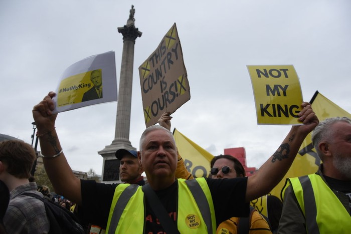TOPSHOT - Protesters hold up placards saying 'Not My King' in Trafalgar Square close to where Britain's King Charles III and Britain's Camilla, Queen Consort will be crowned at Westminster Abbey in central London on May 6, 2023. - The set-piece coronation is the first in Britain in 70 years, and only the second in history to be televised. Charles will be the 40th reigning monarch to be crowned at the central London church since King William I in 1066. Republican opponents who want an elected head of state plan to protest on the day with signs declaring 