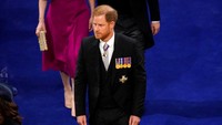 Harry tiba di lokasi tanpa didampingi istrinya, Meghan Markle. Reuters/Andrew Matthews.