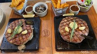 Mau makan dengan pasangan juga bisa pesan Cowboys Steak seharga Rp 480.000. Menu ini termasuk Rib Eye meltique yang disajikan di atas hot stone bersama potongan kentang, sayur, hingga lemon tea. Foto: detikFood
