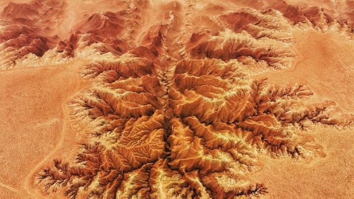 1487433161 ULANQAB, CHINA - MAY 01: Aerial view of Dahong Mountain after thousands of years of wind and rain erosion on May 1, 2023 in Ulanqab, Inner Mongolia Autonomous Region of China. (Photo by VCG/VCG via Getty Images)