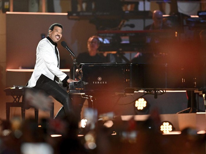 Lionel Richie performs during the concert at Windsor Castle in Windsor, England, Sunday, May 7, 2023, celebrating the coronation of King Charles III. It is one of several events over a three-day weekend of celebrations. (Leon Neal/Pool Photo via AP)