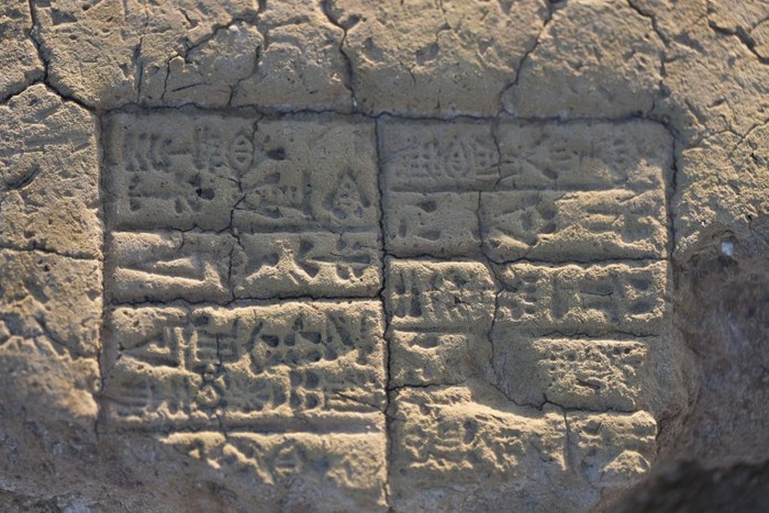 A picture taken on May 1, 2023, shows a cuneiform inscription at the excavation site of the ancient Sumerian city of Girsu, now known as Tello, in Iraqs al-Shatrah district of the southern Dhi Qar province. (Photo by Asaad NIAZI / AFP) (Photo by ASAAD NIAZI/AFP via Getty Images)