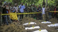 Otoritas lokal dan juru bicara militer melaporkan kuburan massal ditemukan di daerah yang digunakan untuk bercocok tanam di desa Ndoma, provinsi Kivu Utara, Kongo.  