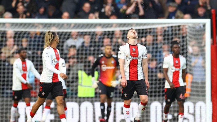 SOUTHAMPTON, ENGLAND - MARCH 18: James Ward-Prowse of Southampton looks dejected after Ivan Perisic of Tottenham Hotspur scores the teams third goal during the Premier League match between Southampton FC and Tottenham Hotspur at Friends Provident St. Marys Stadium on March 18, 2023 in Southampton, England. (Photo by Michael Steele/Getty Images)