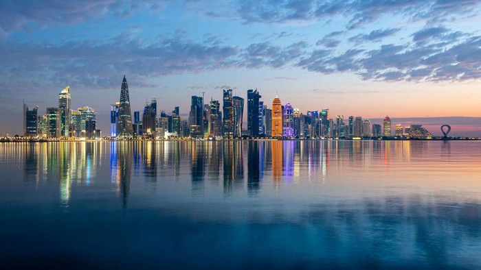 1252007581 A picture taken on 20 April 2023 General view of sunrise at Doha Corniche in Doha,Qatar on 20 April 2023 (Photo by Noushad Thekkayil/NurPhoto via Getty Images)