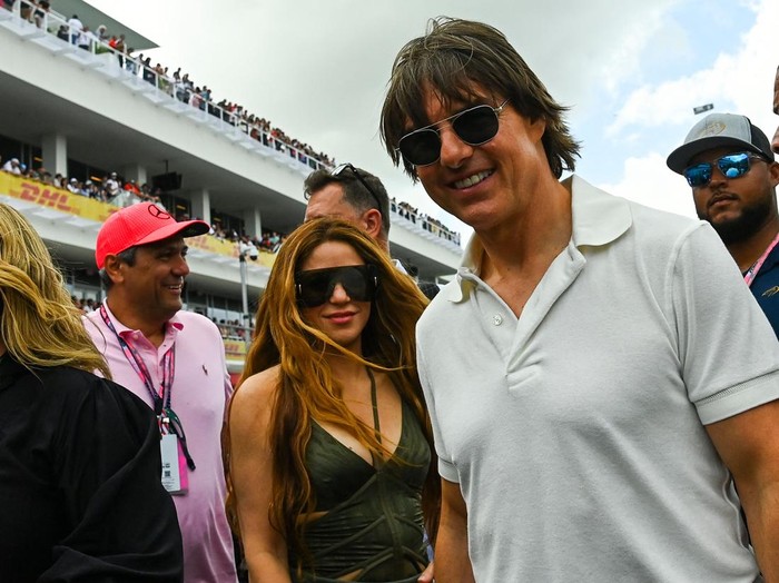 US actor Tom Cruise (R) and Colombian singer Shakira (L) attend the 2023 Miami Formula One Grand Prix at the Miami International Autodrome in Miami Gardens, Florida, on May 7, 2023. (Photo by CHANDAN KHANNA / AFP) (Photo by CHANDAN KHANNA/AFP via Getty Images)