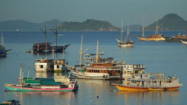 Pinisi boats anchored at the port in Labuan Bajo, West Manggarai, Indonesia, on Saturday, April 29, 2023. Indonesia is scheduled to report first-quarter gross domestic product on May 5. Photographer: Dimas Ardian/Bloomberg via Getty Images